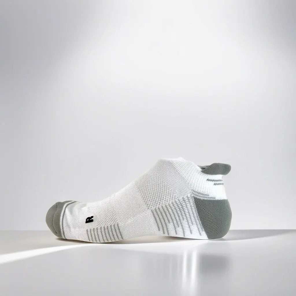 white and grey low-cut tennis socks with breathable mesh and secure fit strip