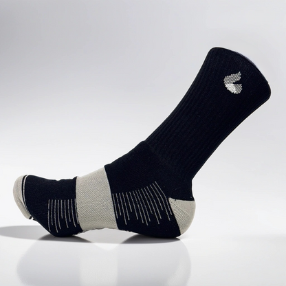 black and grey crew tennis socks with metatarsus compression and cushioned sole